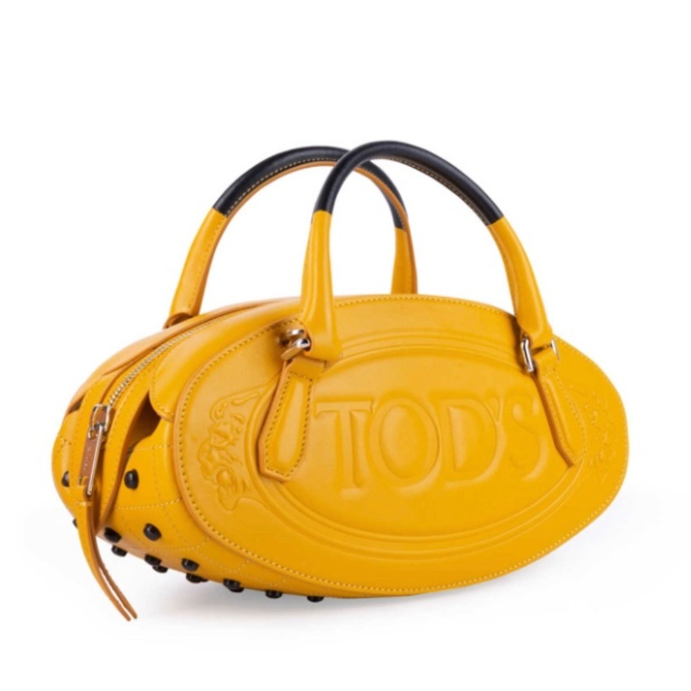 IN SEARCH OF ??? NOT SELLING 
NWT Tods mini convertible bag